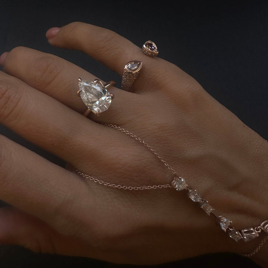Open pear shape Morganite Ring